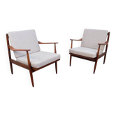 Vintage teak lounge chair, retro 1960s–70s style.