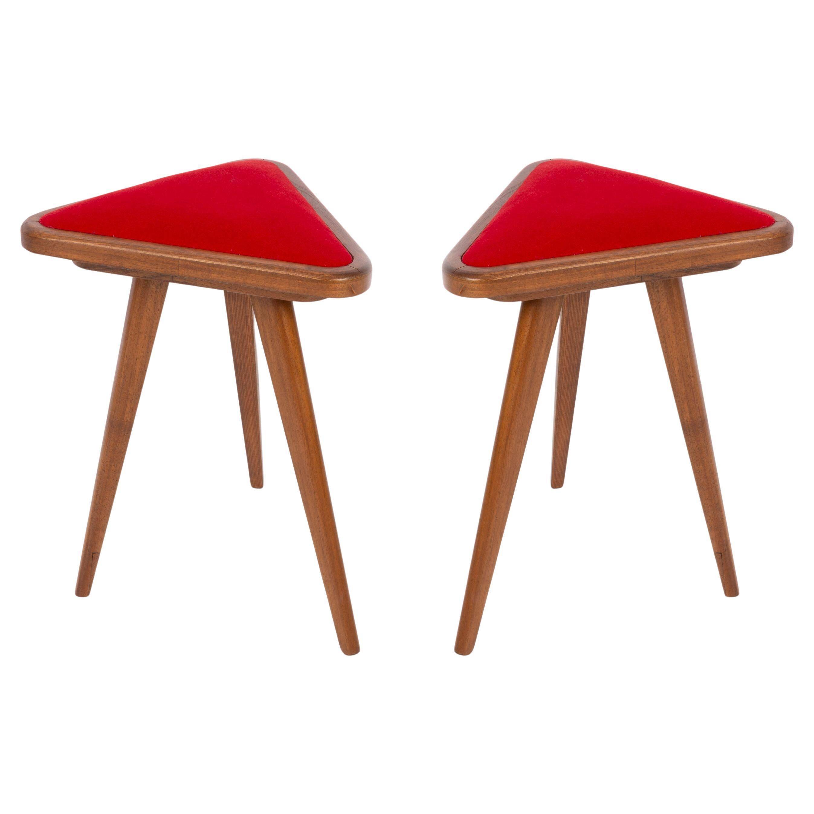 Set of two triangular red velvet stools from the 20th century, Europe, 1960s.