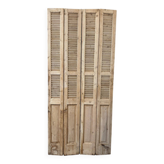 Old folding shutters with louvers