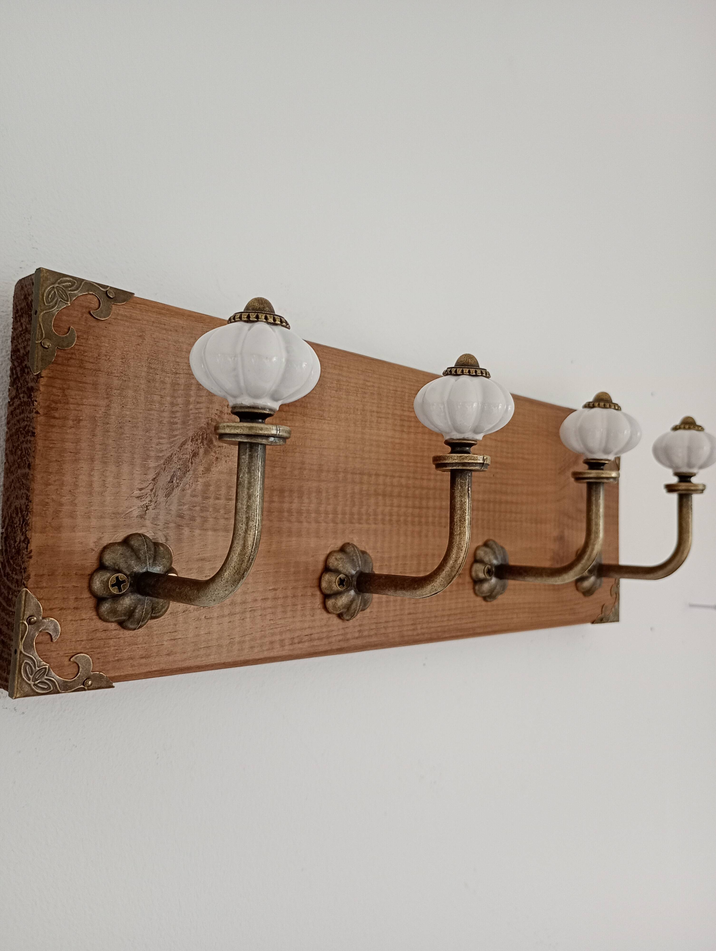 Wall coat rack with 4 metal hooks and white ceramic knobs, handmade.