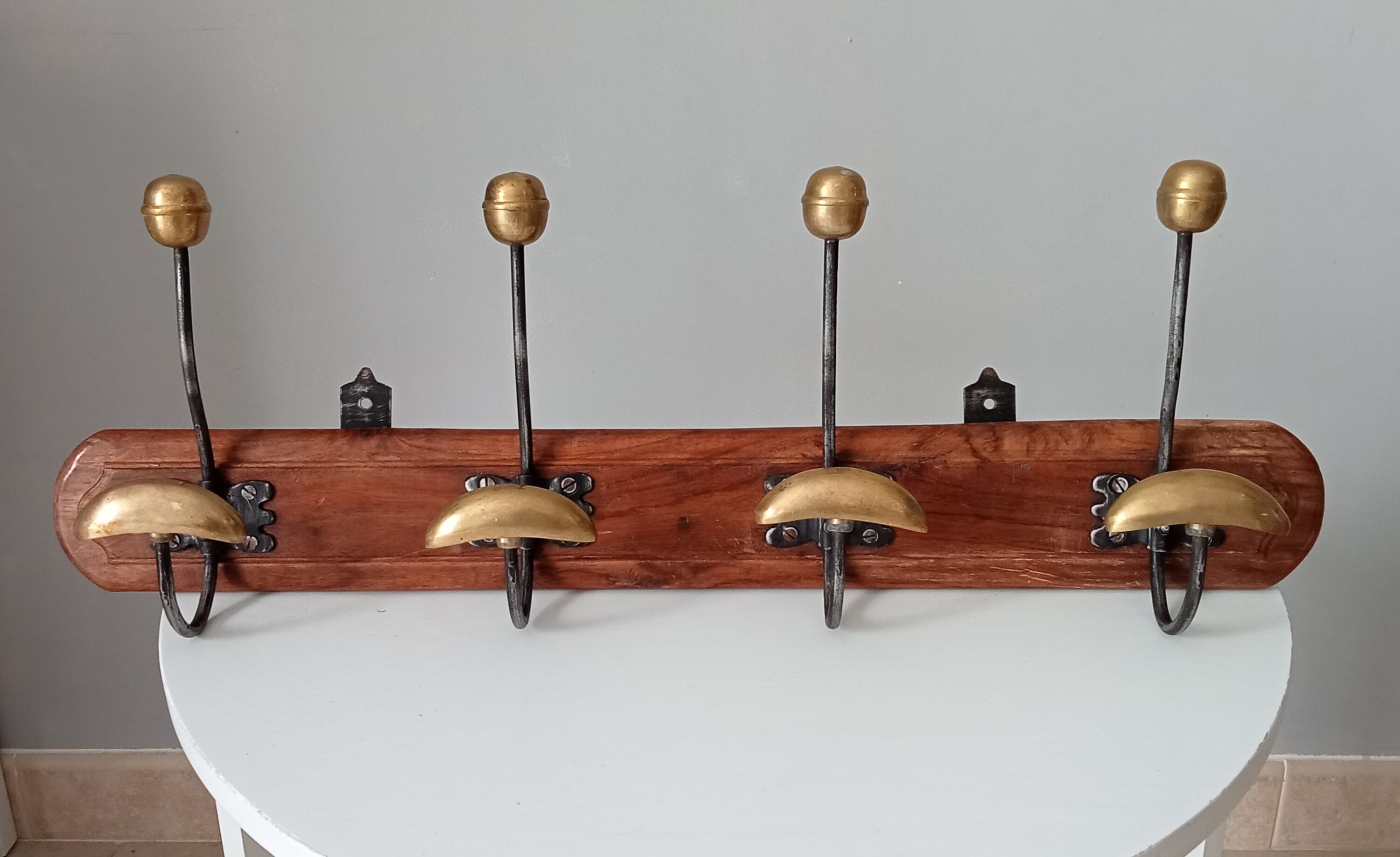 Old coat rack in solid brass