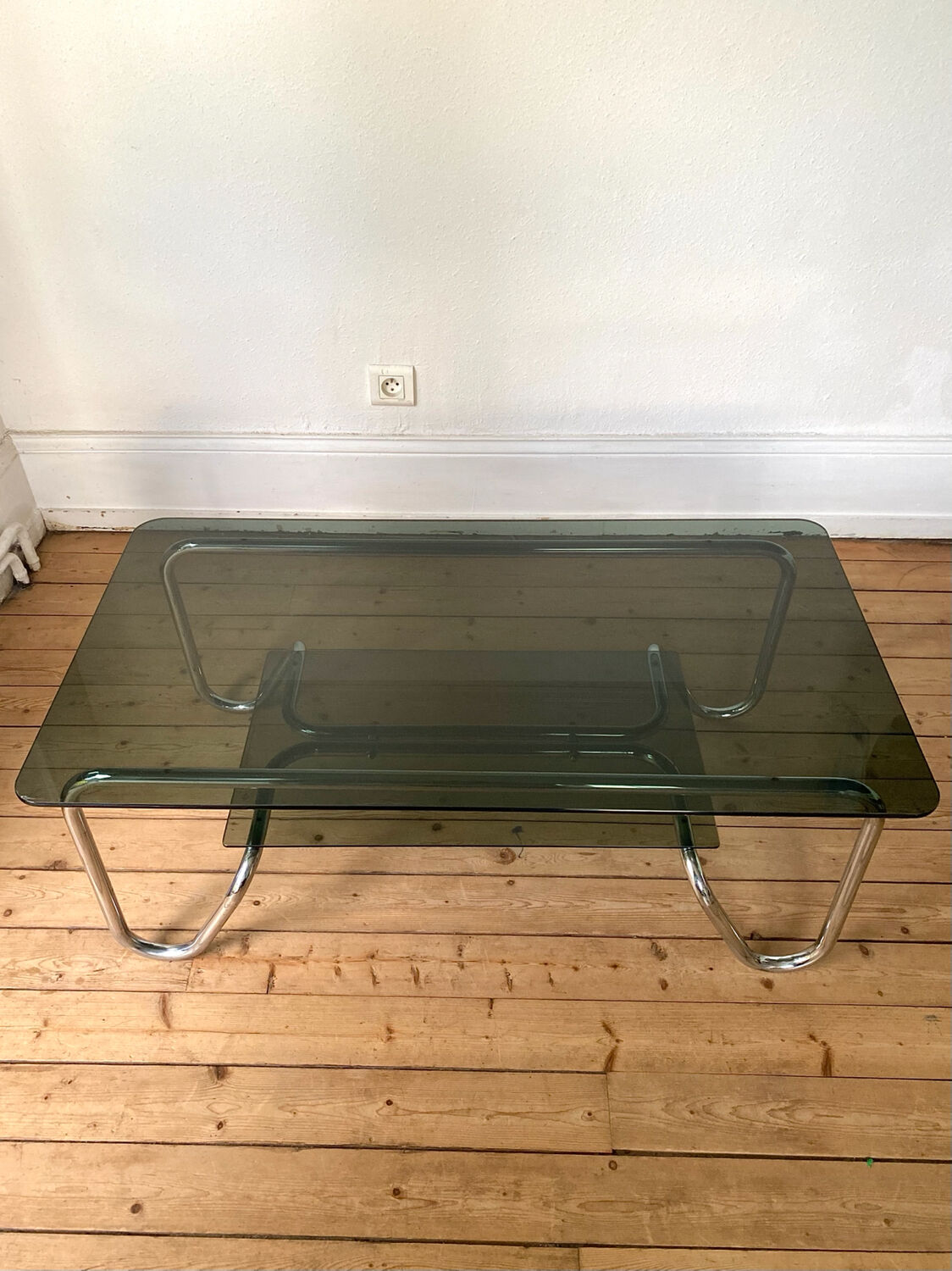 Tubular frame smoked glass coffee table 1970 vintage
