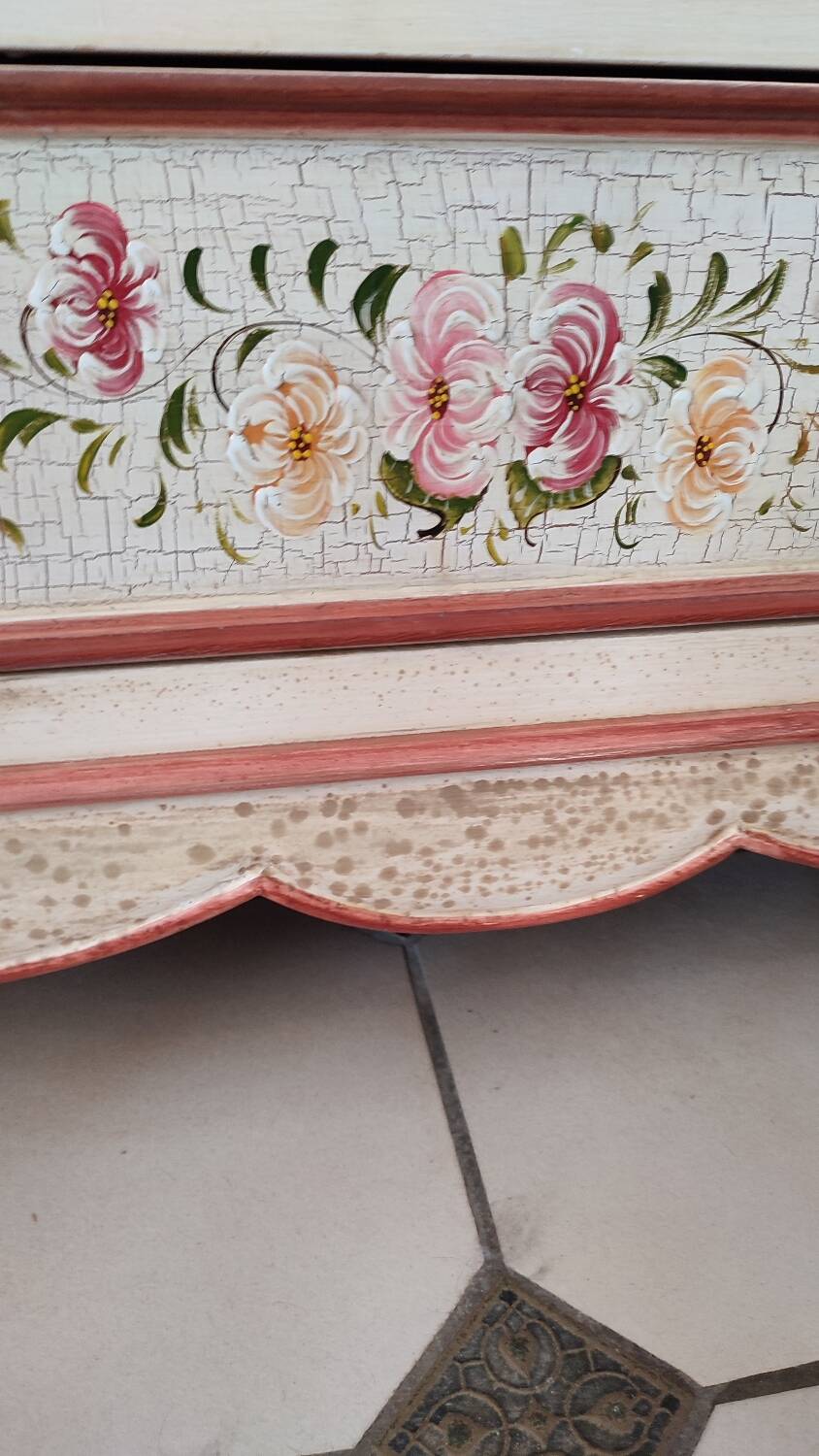Painted chest of drawers with floral decoration