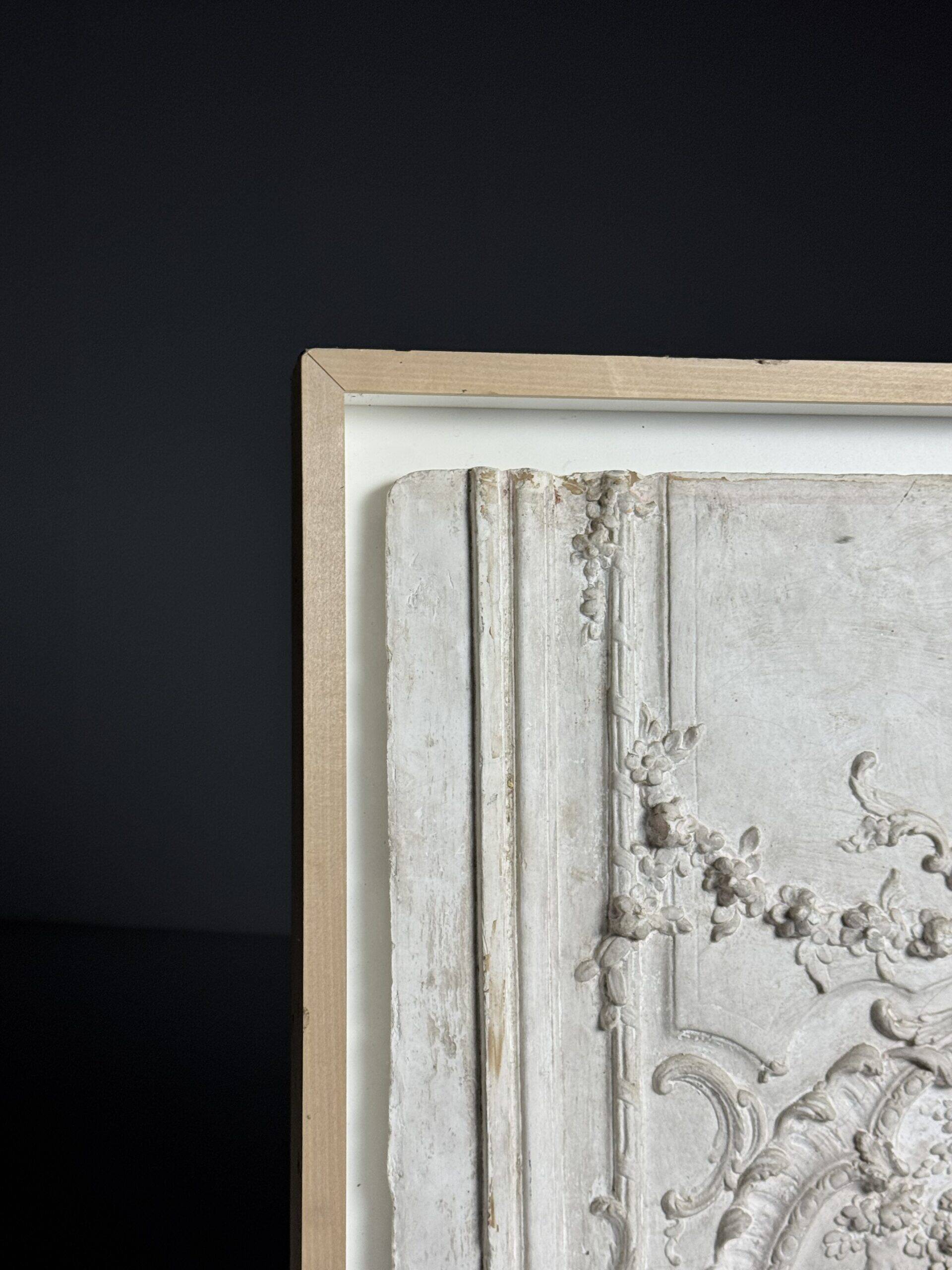 Plaster ceiling fragment framed