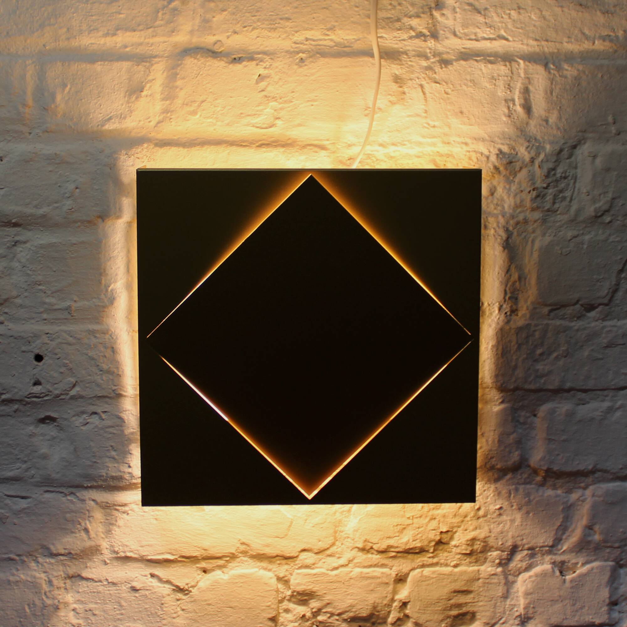 Pair of vintage Raak golden wall lights model 1556