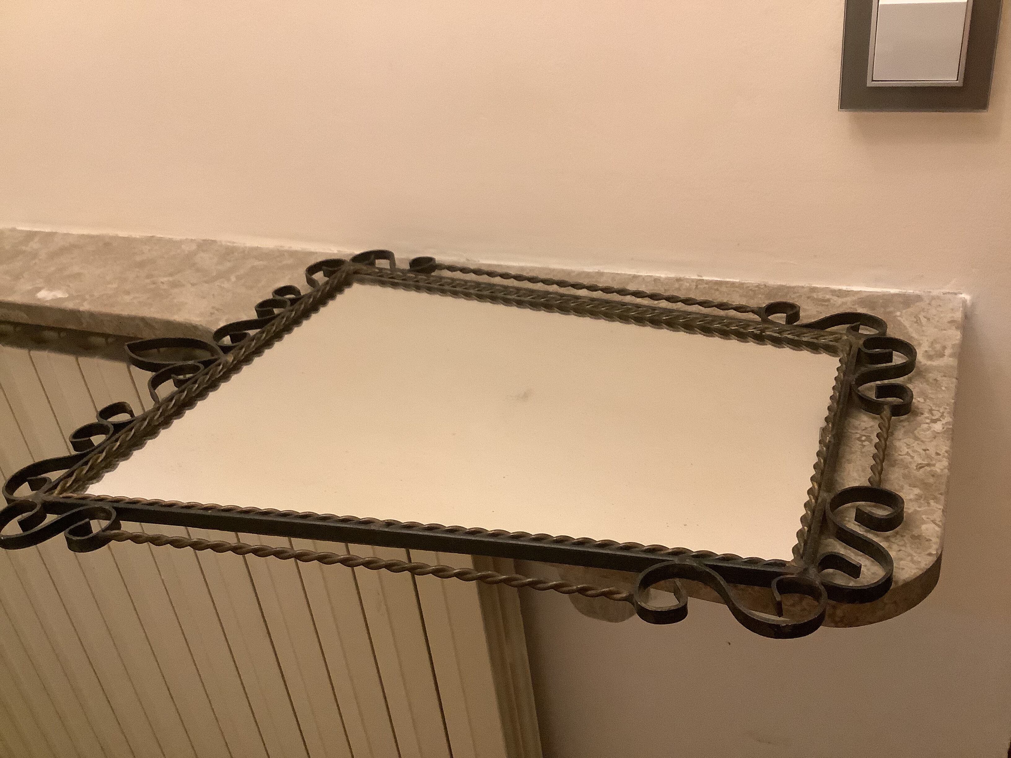 Ancient asymmetrical brutalist mirror wrought iron