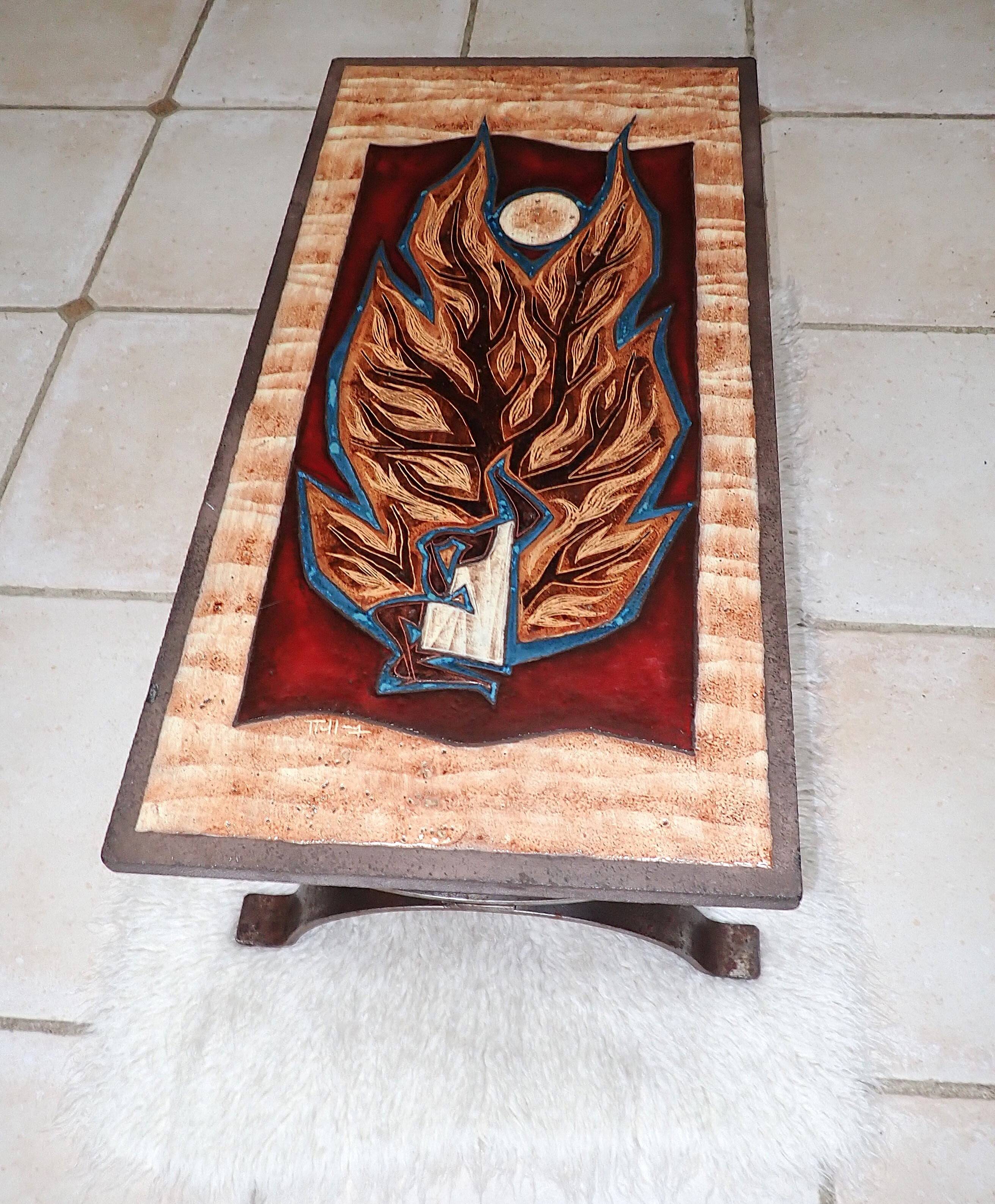 Enameled lava coffee table by Jean Jaffeux