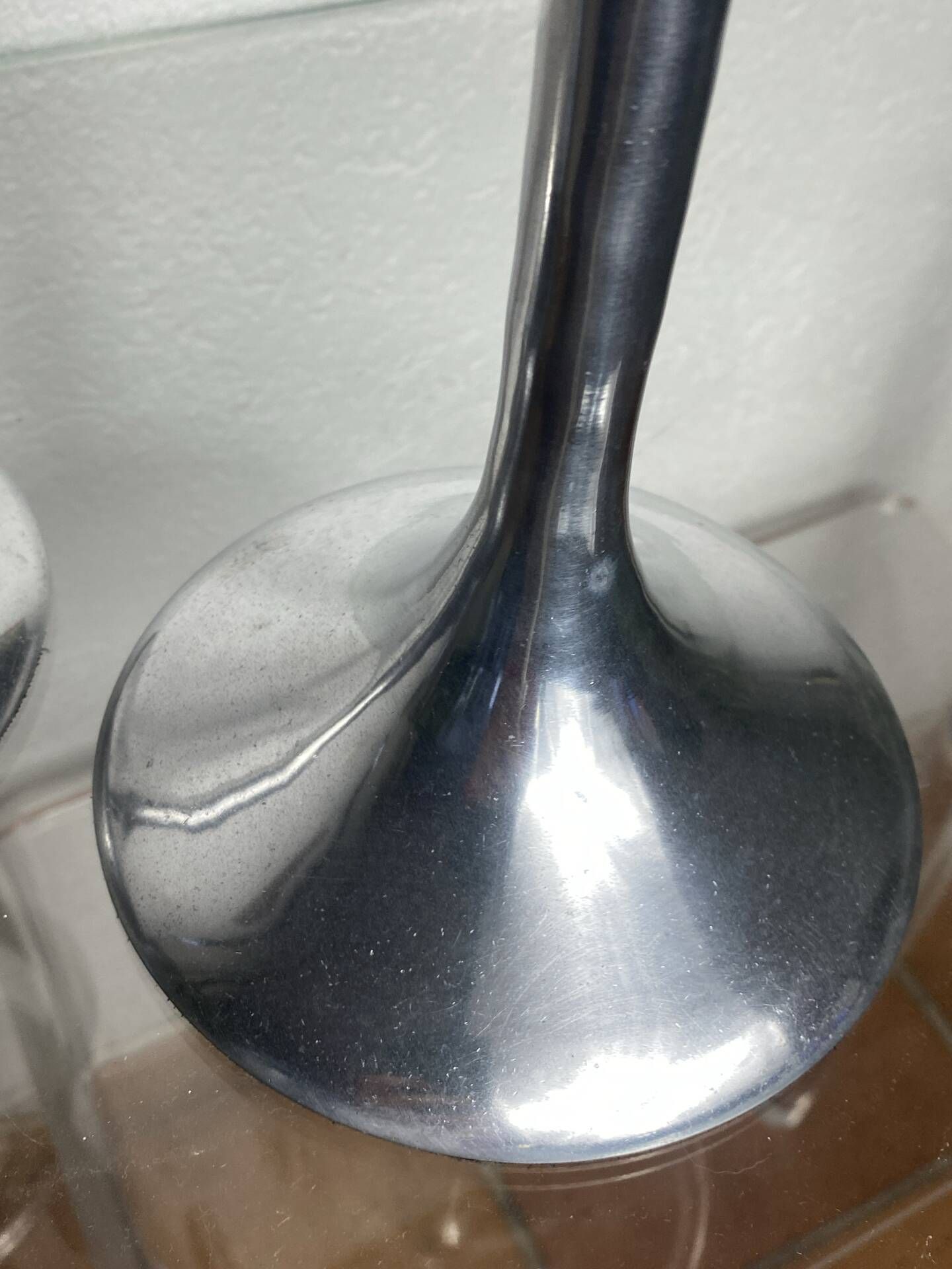 Pair of large aluminium bow candlesticks, Italy, 1970.
