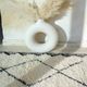 Berber carpet Béni Ouarain black and white with diamonds and braided border