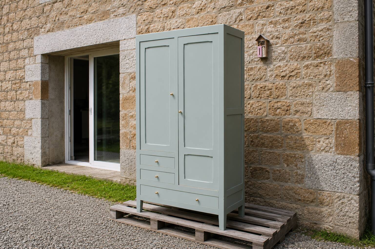 Vintage Parisian wardrobe in muted sage green.