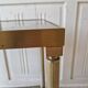 Gold brass side table  
Accent table