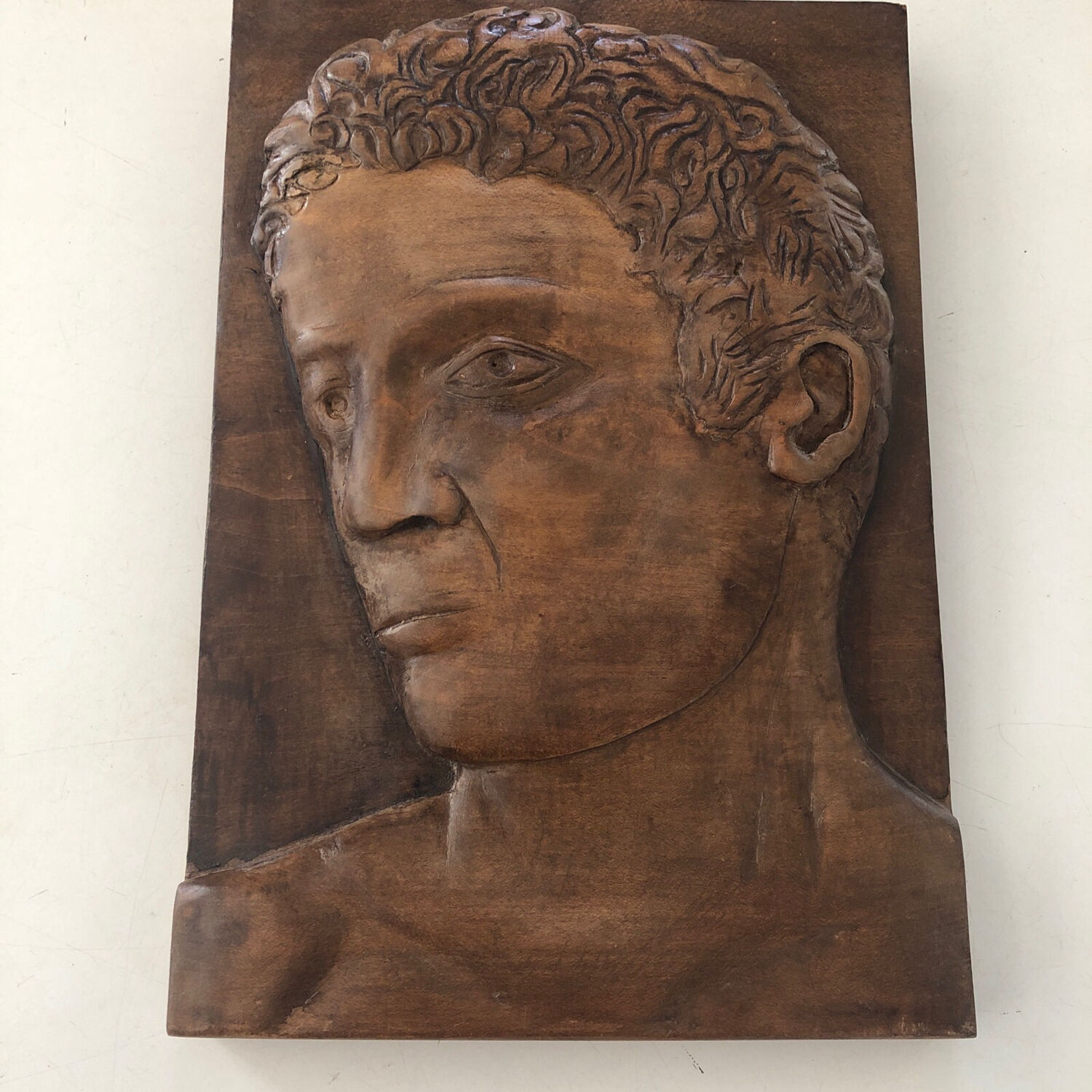 Wood carving profile man signed