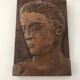 Sculpture sur bois profil homme signée
