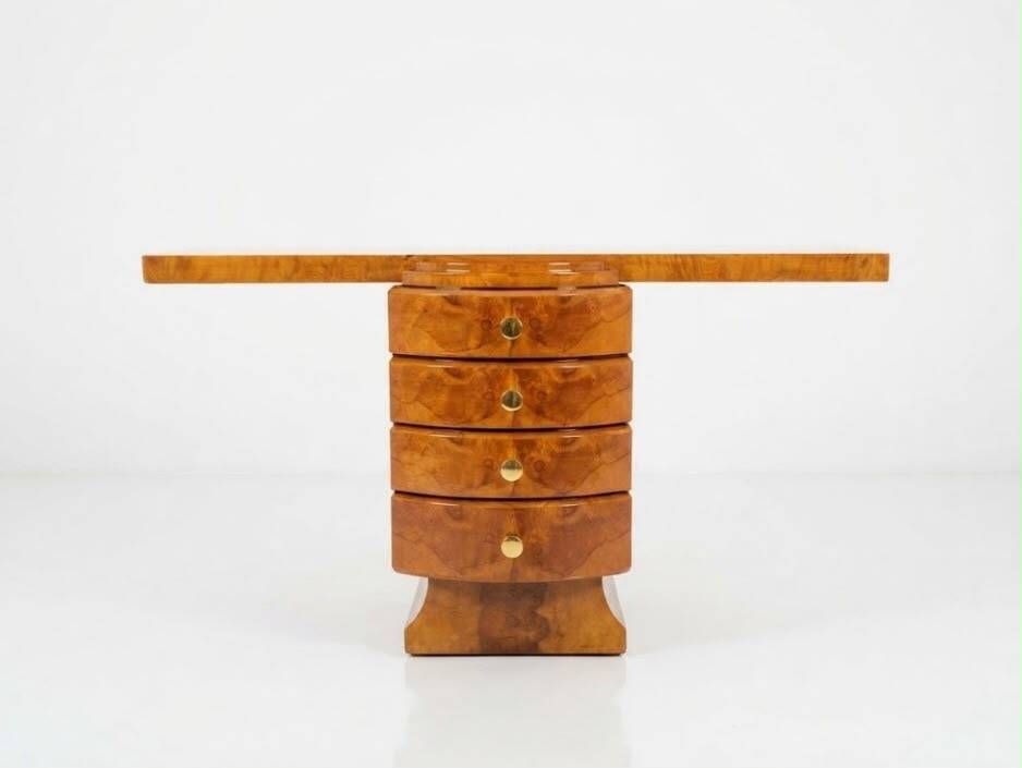An Art Deco console made of beech wood with elm burl and 5 drawers.
