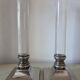 Pair of lucite and silver-plated candlesticks