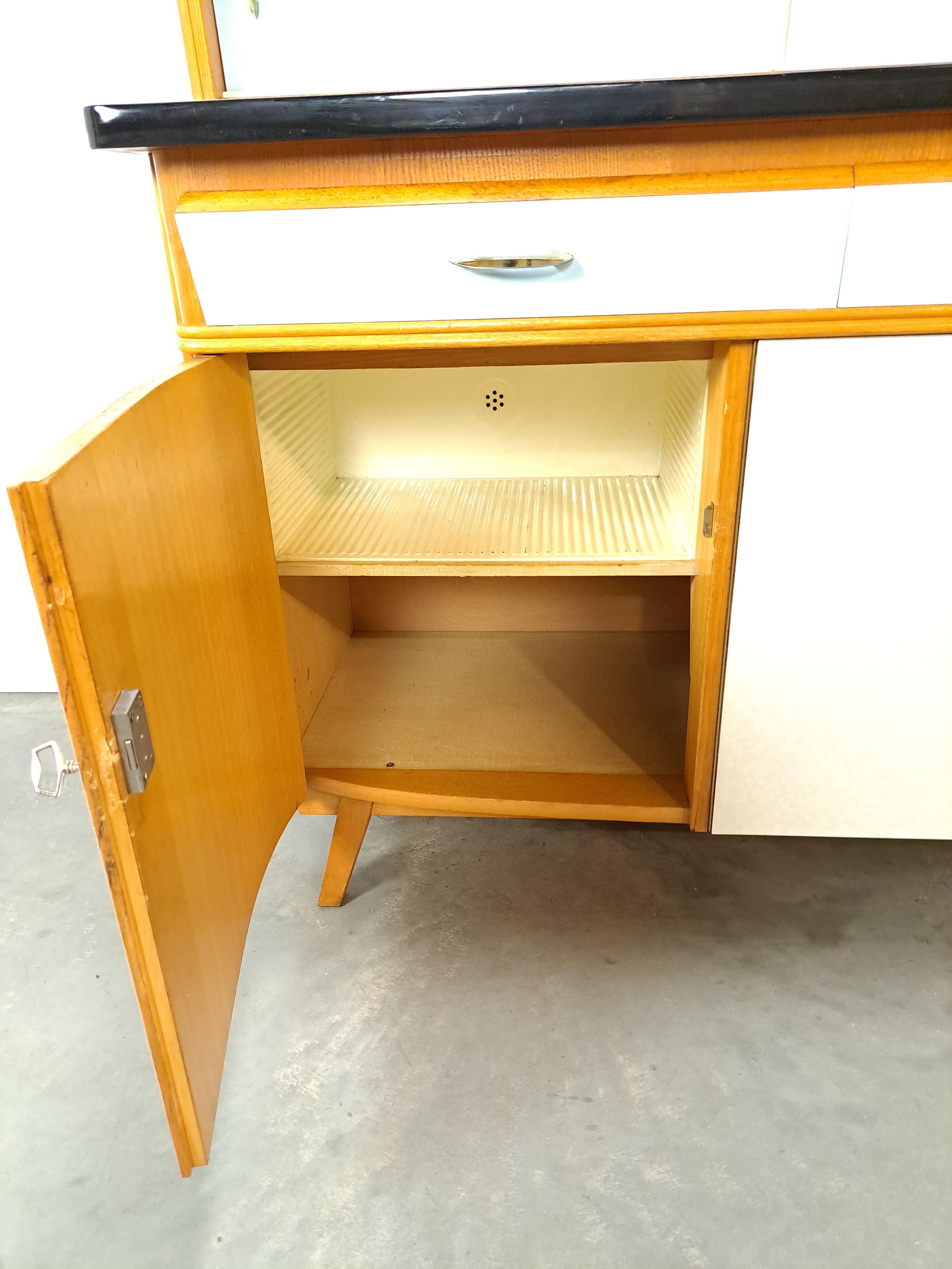 50s vintage kitchen cabinet with brass and formica
