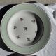 Set of 9 vintage turquoise deep plates with gold trim and pink flowers.
