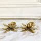 Pair of brass flower candle holders