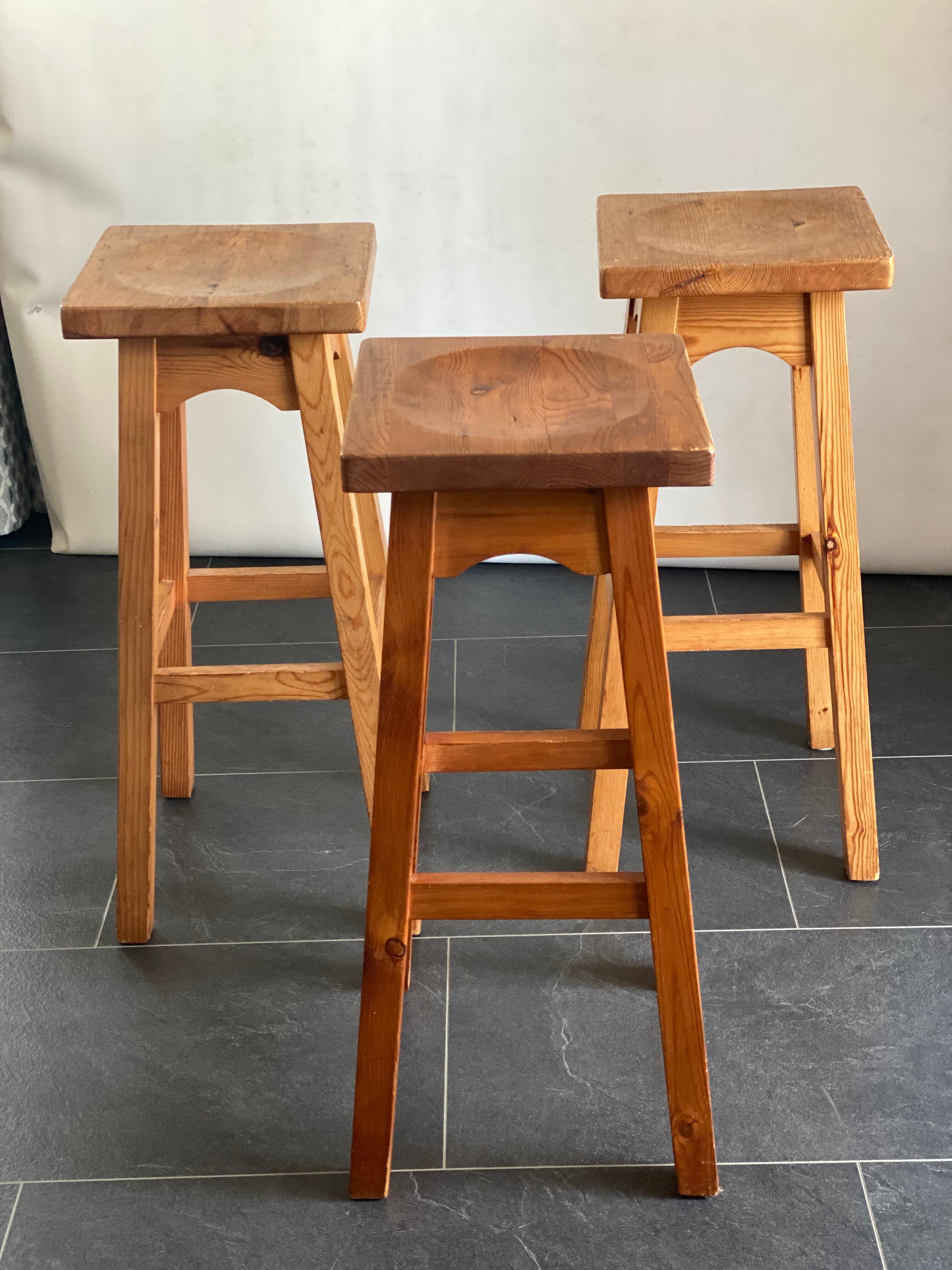 Trio of vintage pine wood bar stools