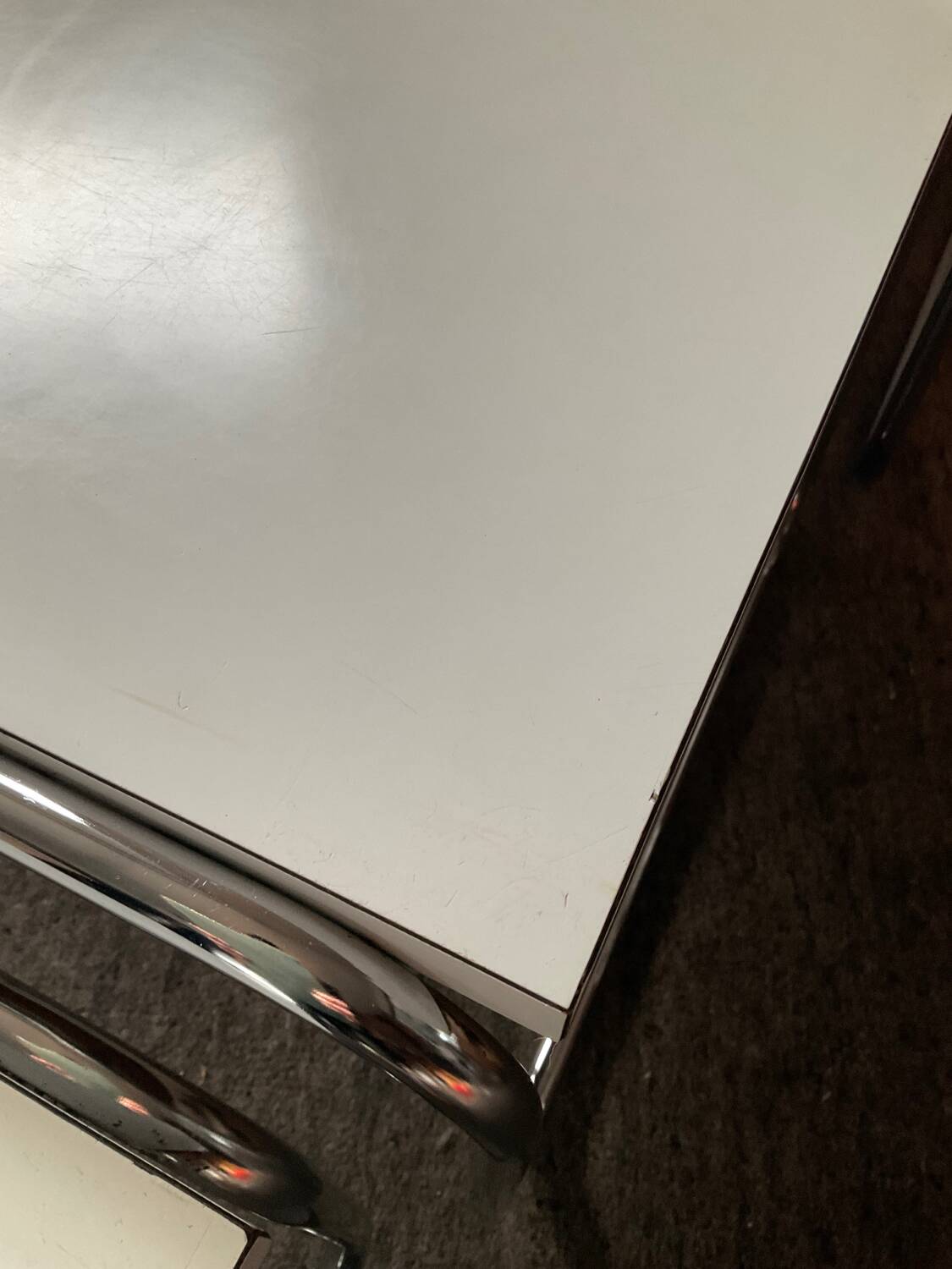 Trio of vintage nesting tables in Formica and chrome metal