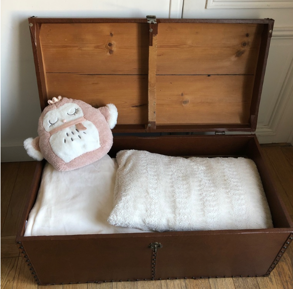 Ancient wooden and faux leather trunk