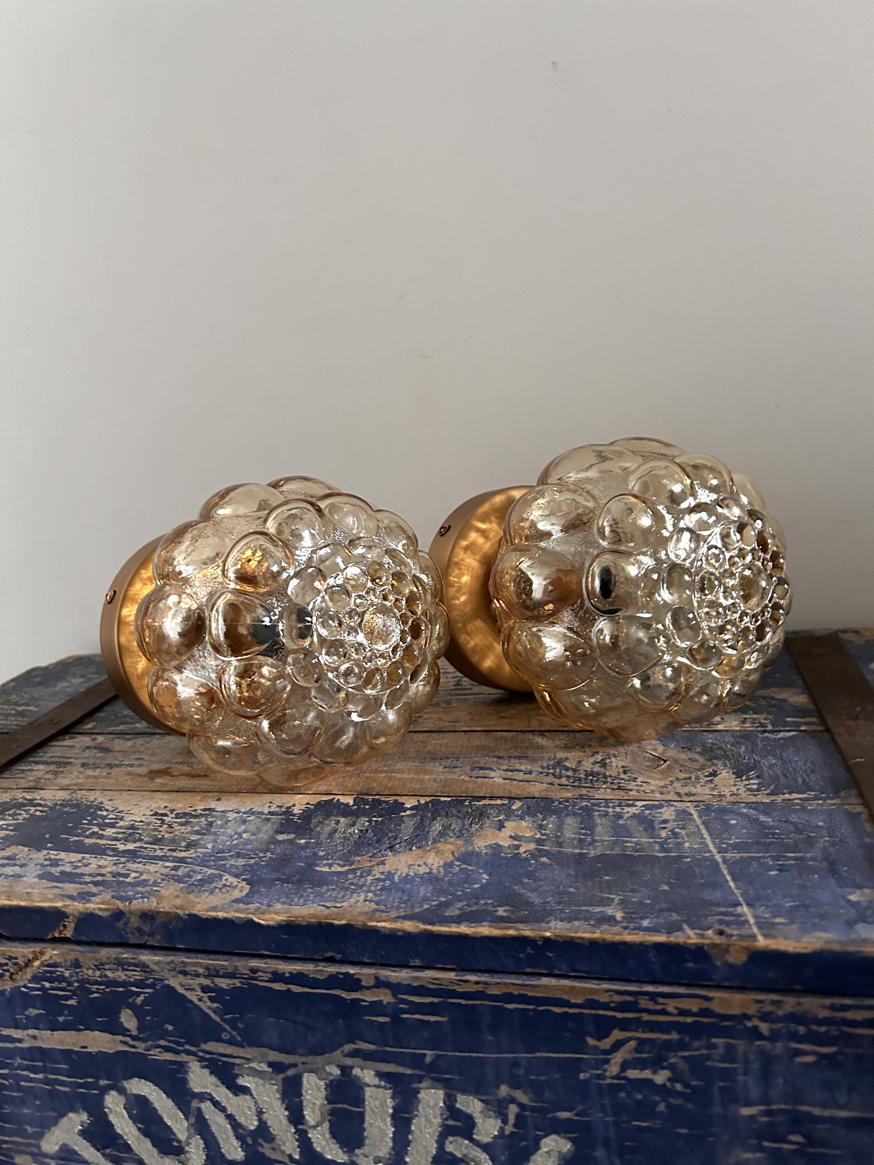 Pair of Scandinavian golden globe wall lights