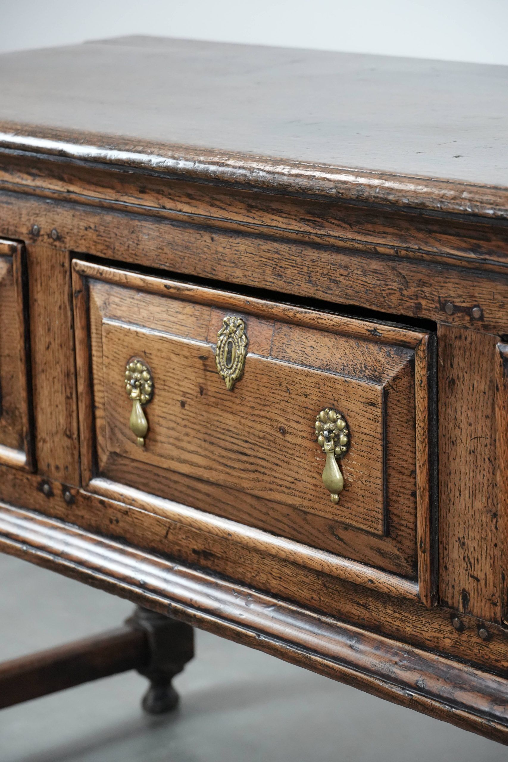 Antique English sideboard from the early 18th century made of oak