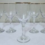 6 15cl stemmed glasses with gilding around the perimeter