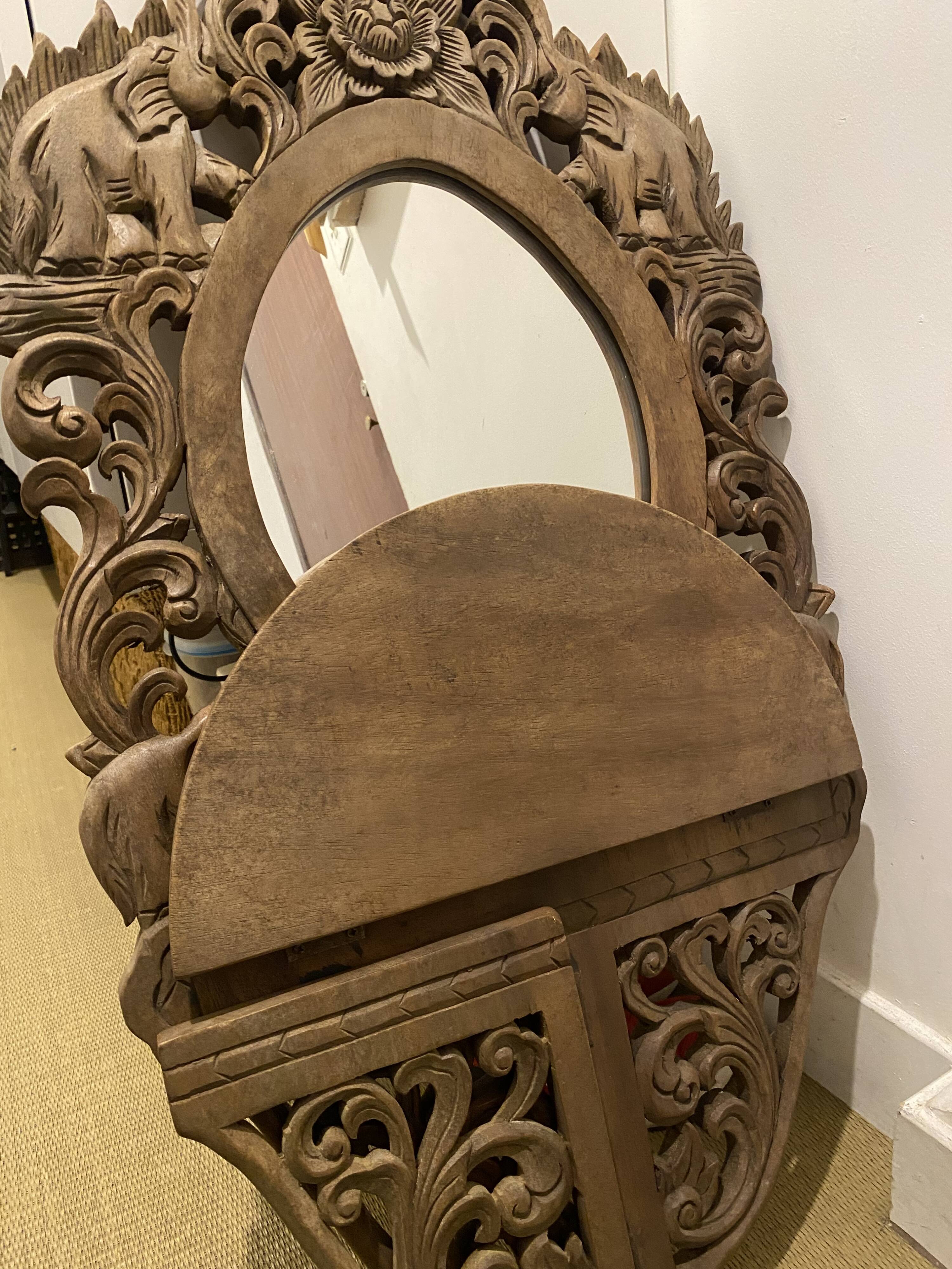 Carved mirror with integrated shelf