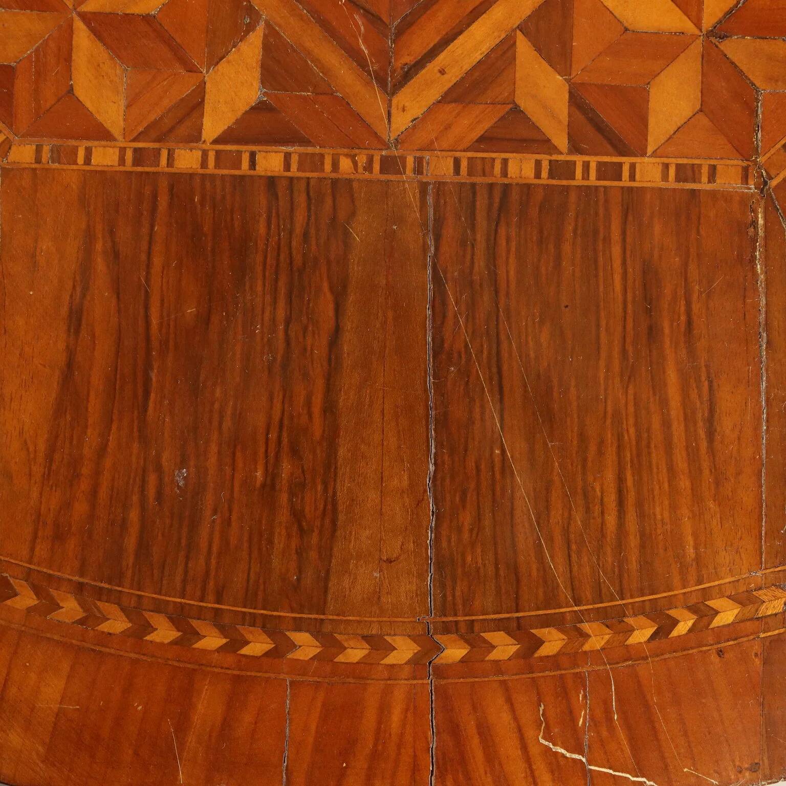 Antique round walnut table with a baluster central leg, Italy, 19th century.