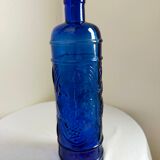 cobalt blue molded glass bottle in relief decoration bunches of grapes