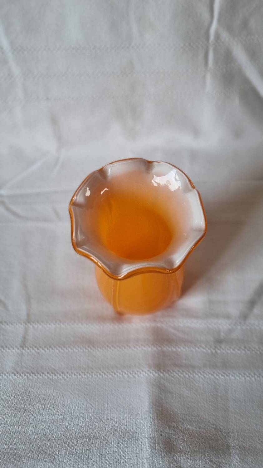Orange fluted glass vase