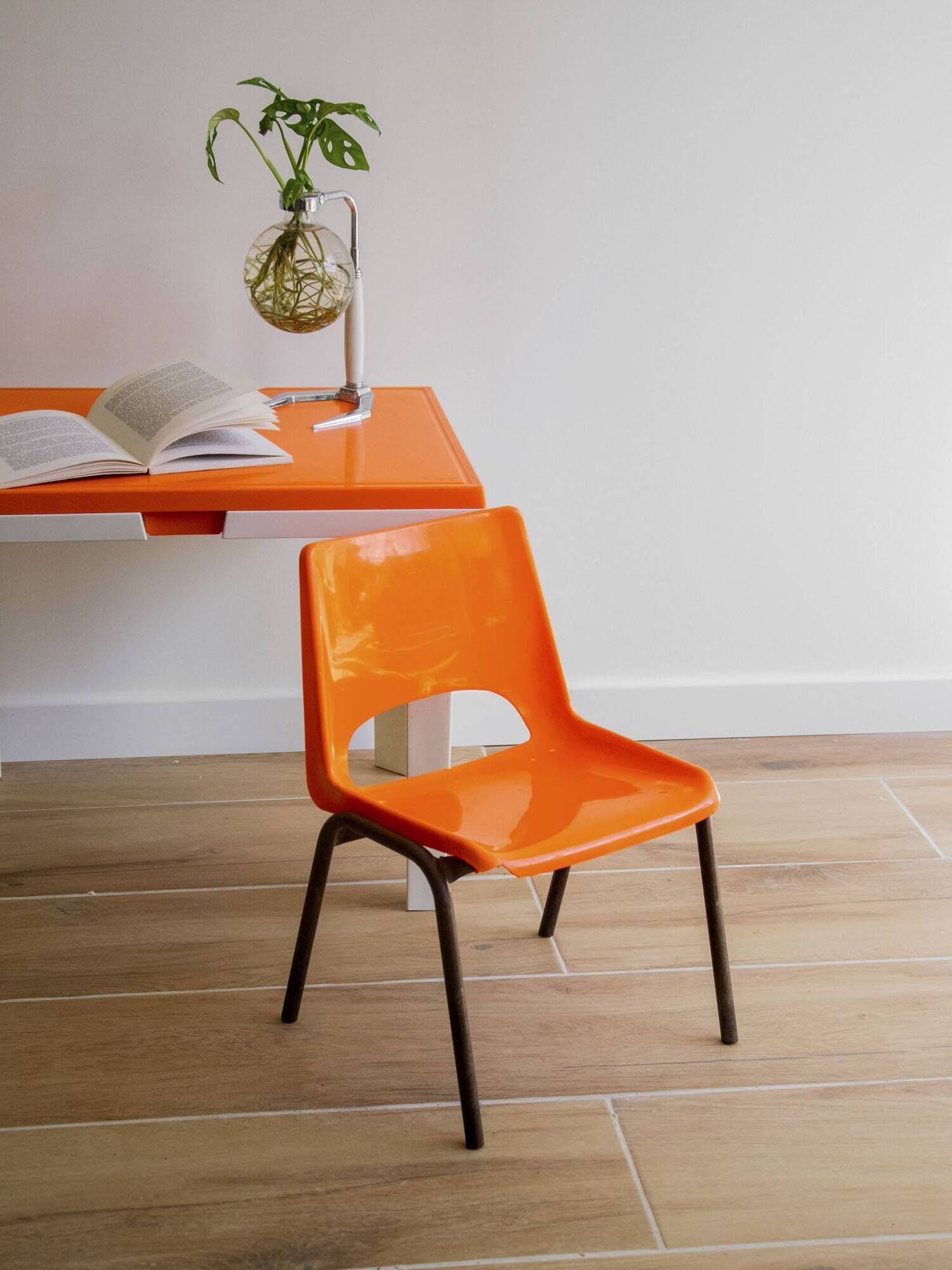 Vintage orange children's chair from the seventies.