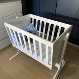 White wooden cradle