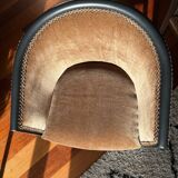 Pair of Art Deco barrel chairs in black and bronze