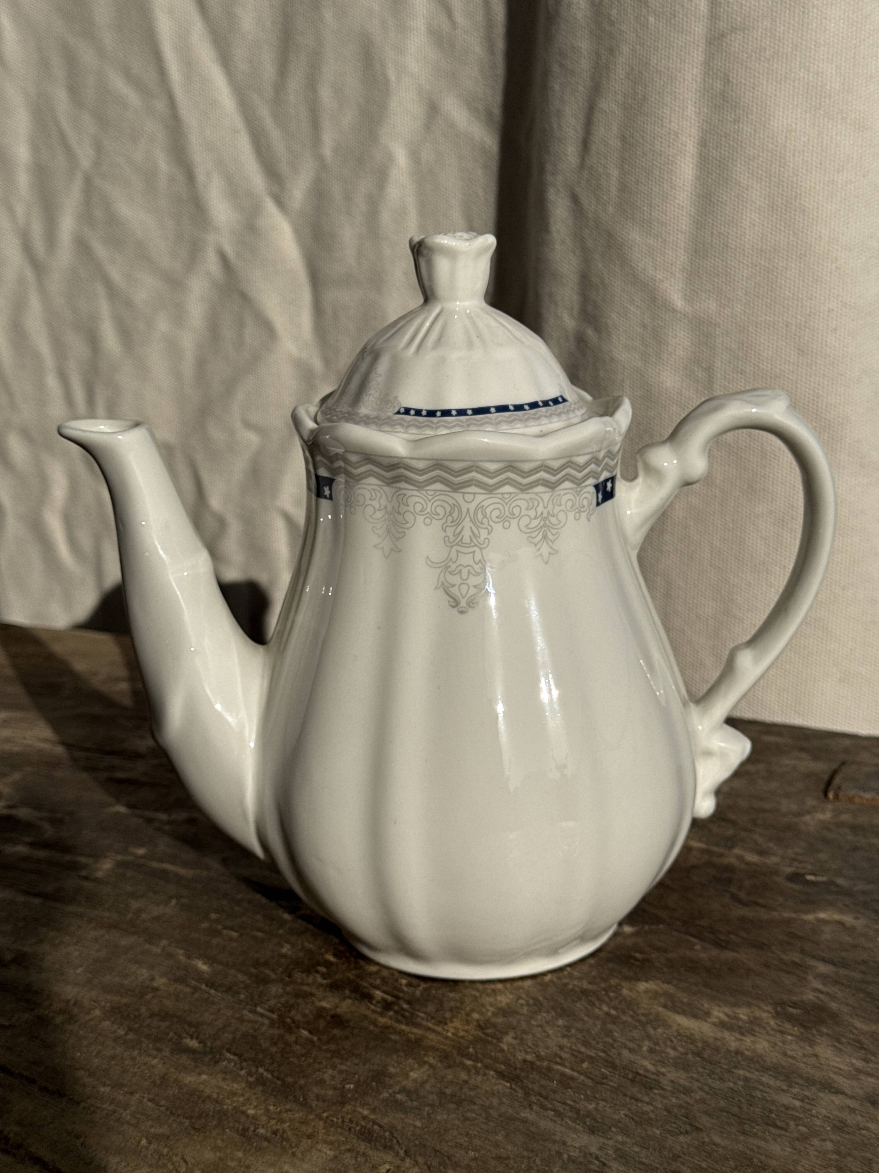 White earthenware teapot with blue and silver trim H22.5