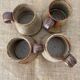 4 pyrite stoneware cups attributed to Jean-Pierre Prudhomme. 1960s.