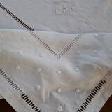 Old white linen tablecloth and stylized monogram embroidery days and plumetis