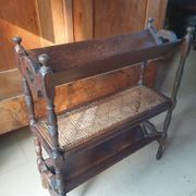 Magazine/book rack in oak with a caned top - early 20th century