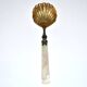 Empire sprinkling spoon in gilded silver vermeil and mother-of-pearl, 19th century.