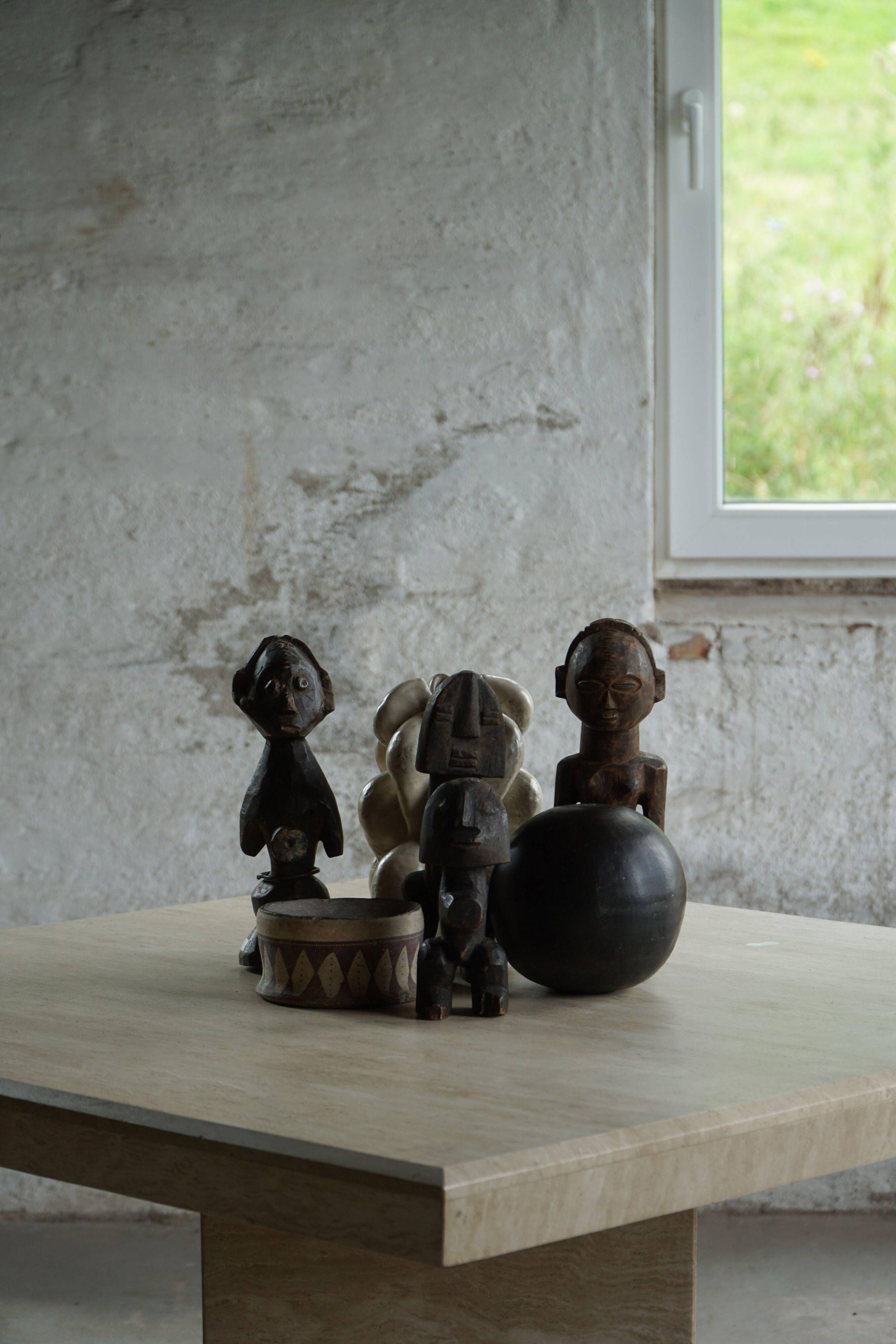 Set of 4 decorative handcrafted African wooden sculptures, mid-century.