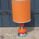Designer lamp from the 70s in chrome metal and orange lacquered wood