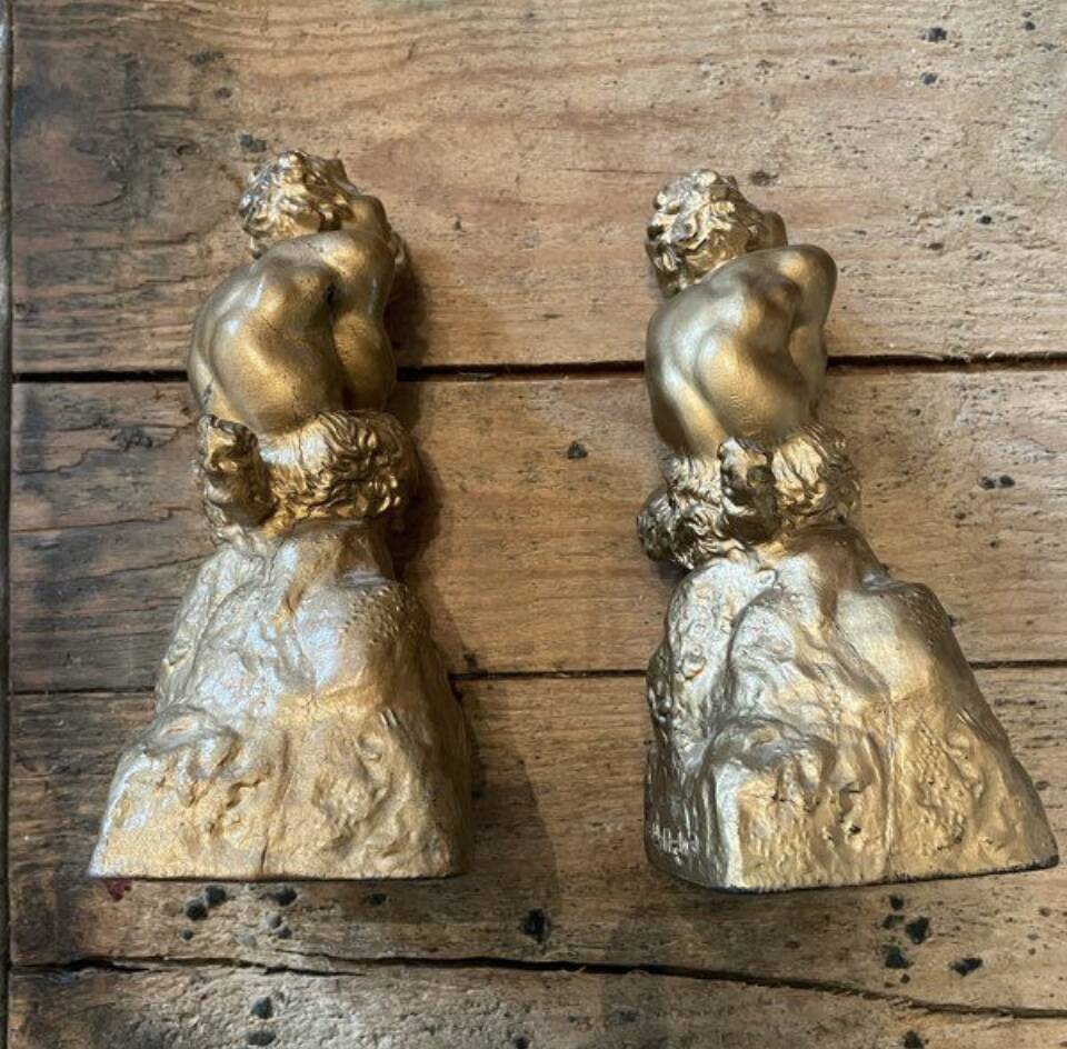 2 Seated satyr sculptures in cast bronze