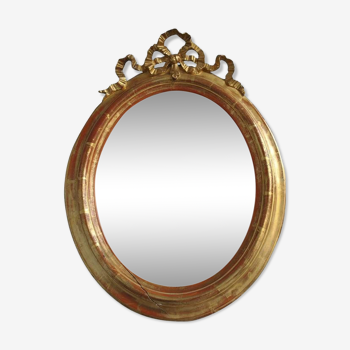 Miroir médaillon doré de style Louis XVI époque fin XIXème