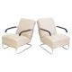 Pair of beige leather and tubular steel armchairs.