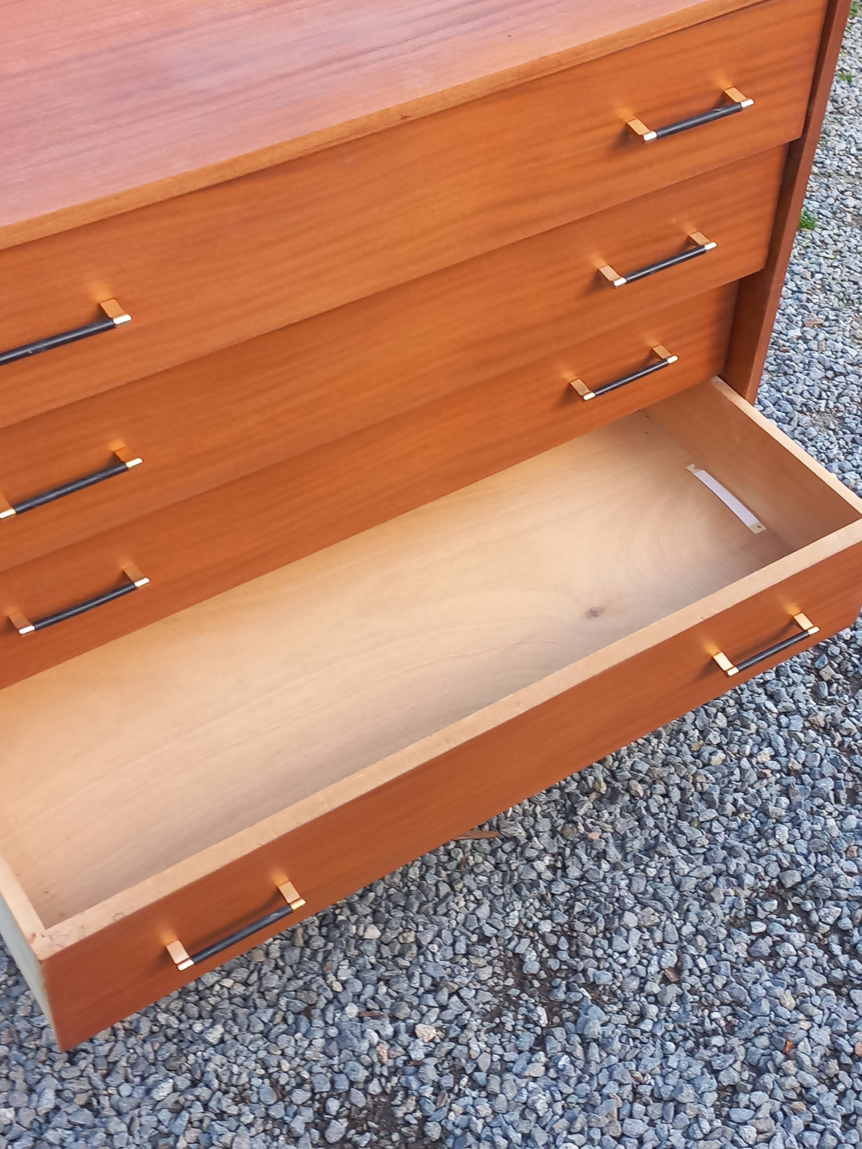 Vintage mahogany commode with metal tapered legs, 4 drawers, 1950s.