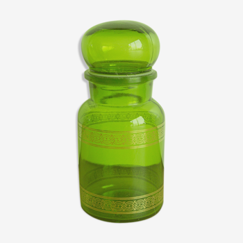 Green and gold glass jar