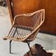Rattan armchair and black metal base 1960