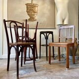2 bistro chairs in arched and dark wood