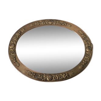 Oval mirror in plaster and art deco wood 36 x 46 cm